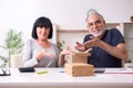 Old couple doing the online shopping Royalty Free Stock Photo