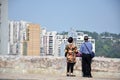 An old couple enjoy the beauty of Macau cityscape
