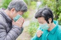 Old couple get cold Royalty Free Stock Photo