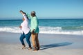 Old couple having fun at the beach Royalty Free Stock Photo