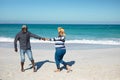 Old couple having fun at the beach Royalty Free Stock Photo