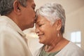 Old couple, man kiss woman on forehead with love and bonding at home, love and life partner in marriage with peace