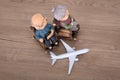 Old couple model and an airplane model Royalty Free Stock Photo