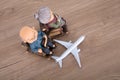 Old couple model and an airplane model Royalty Free Stock Photo