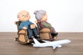 Old couple model and an airplane model Royalty Free Stock Photo