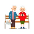 Old couple with phone. Grandmother and grandfather are sitting on bench and smiling read messages in smartphone. Happy retirement