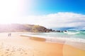 Old couple walking on Australian Beach on the Pacific Ocean Royalty Free Stock Photo