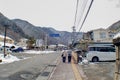 Old couple is walking in Nagano in winter in Japan.