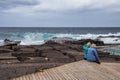 Old couple watching the ocean, Mesa del Mar, Tenerife, Canary Islands, Spain