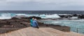 Old couple watching the ocean, Mesa del Mar, Tenerife, Canary Islands, Spain