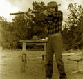 Old Cowboy Shooting Royalty Free Stock Photo