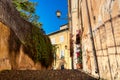 Old cozy street with a staircase in Rome, Italy during summer sunny day Royalty Free Stock Photo