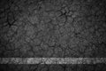 Old crack asphalt road with white lines. Royalty Free Stock Photo