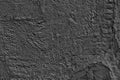 Old cracked black textured plaster exterior wall background. Aged rough dark cement grunge texture Royalty Free Stock Photo
