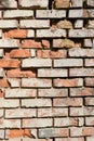 Old brick cracked wall with deep gaps between the blocks Royalty Free Stock Photo