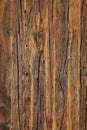 Texture and background of a very old brown wood, vertical image