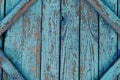 Old cracked fence with blue shabby paint Royalty Free Stock Photo