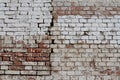 Old cracked red-white brick wall Royalty Free Stock Photo