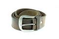 Old cracked rolled up brown leather belt