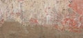 Old cracked weathered shabby red painted and new plastered wall banner background Royalty Free Stock Photo