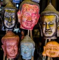 Carved Buddha head masks, Siem Reap, Cambodia