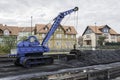 Old crane with bucket to load coal Royalty Free Stock Photo