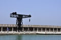 Old crane on the pier