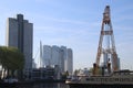 Old cranes, ships, towers, trains and other parts of the harbor for public exhibitation in the Leuvehaven in Rotterdam