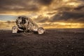 Old crashed plane in Iceland with heavy storm clouds Royalty Free Stock Photo