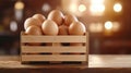 An old crate brimming with fresh brown eggs, set against a soft, blurred backdrop for a rustic charm Royalty Free Stock Photo