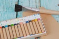 Old Crayon in box on book note Royalty Free Stock Photo