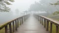 An old, creaky wooden bridge surrounded by mist Royalty Free Stock Photo