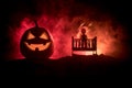 Old creepy eerie wooden baby crib in dark toned foggy background. Horror concept. Scary baby and bed silhouette in dark. Halloween