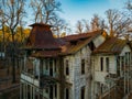 Old creepy wooden abandoned haunted mansion, aerial view Royalty Free Stock Photo