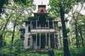 Old creepy wooden abandoned haunted mansion