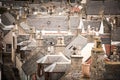 Old croft houses in Cullen, fishing village on Moray Firth, Scotland. Cullen Viaduct in the background, old roofs and chimneys Royalty Free Stock Photo