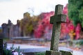 Old Cross in the Autumn Cemetery Royalty Free Stock Photo