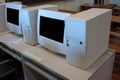 Old CRT computer monitors and towers