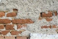 Old crumbling brick wall on abandoned house close up shot Royalty Free Stock Photo