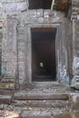 Old, crumbling door, leading to a passage in ancient angkor wat temple, cambodia, asia, home to khmer civilisation Royalty Free Stock Photo