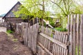 old crumbling wooden picket fence