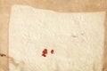 Old, crumpled paper with red sealing wax sign background Royalty Free Stock Photo