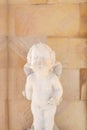 Old Cupid statue. Royalty Free Stock Photo