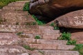 Old curved staircase with stone steps carved into the rock Royalty Free Stock Photo