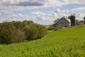 Old dairy barn and hayfield