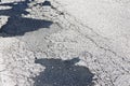 Old damaged asphalt road background Royalty Free Stock Photo