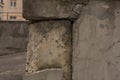Old Damaged block Wall With Cracked White Plaster Layer Royalty Free Stock Photo