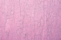 Old Damaged Cracked Paint Wall, Grunge Background, pink pastel color Royalty Free Stock Photo