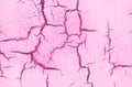 Old Damaged Cracked Paint Wall, Grunge Background, pink pastel color Royalty Free Stock Photo