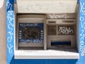 Old damaged destroyed vandalised outdoor ATM, vandalized cash machine detail, closeup. Economical crisis, financial recession Royalty Free Stock Photo